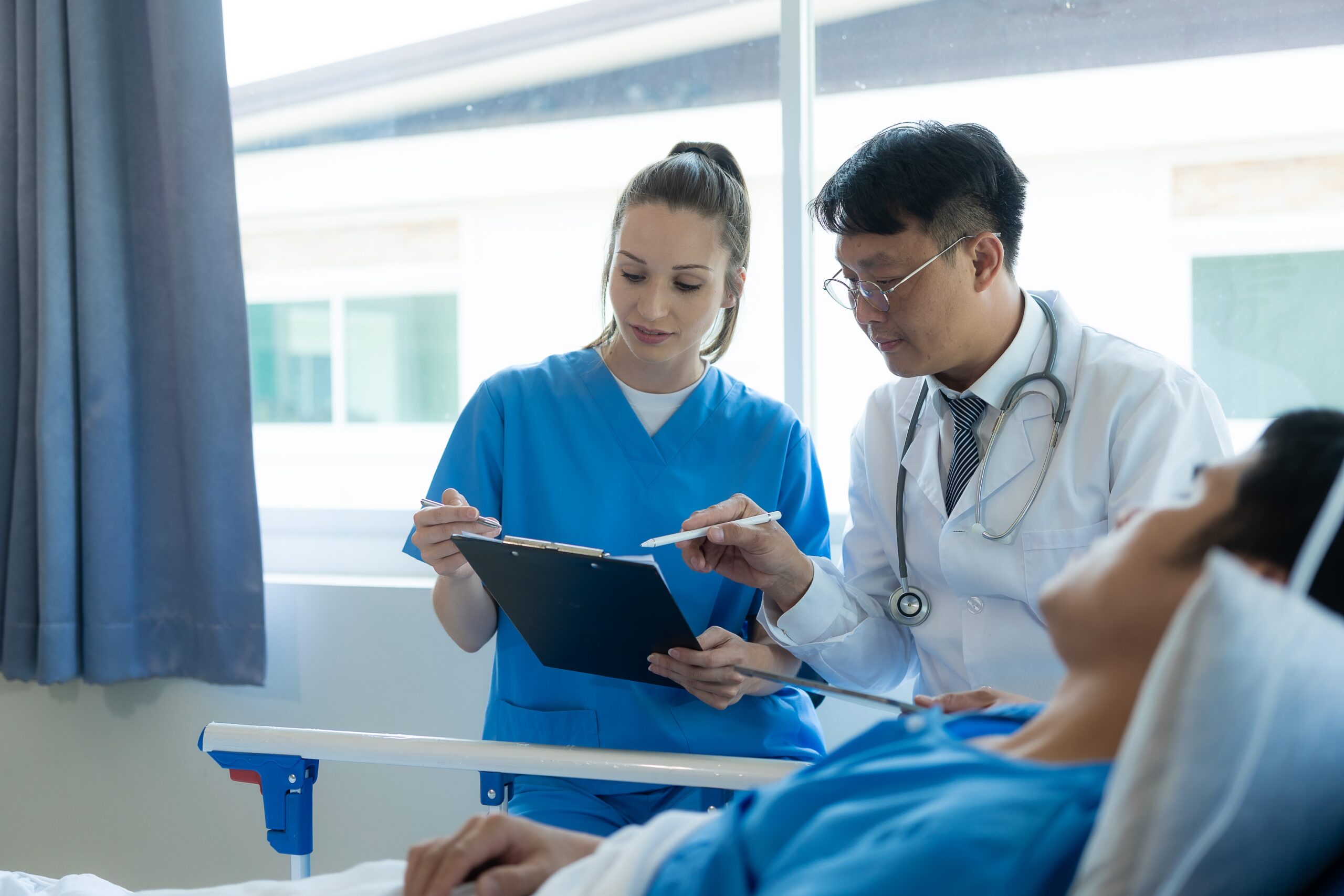 A,Female,Doctor,And,Two,Male,Doctors,Treat,A,Young